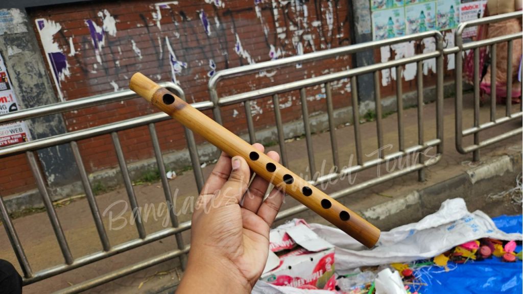 Bamboo flute bansher bashi sold at Pohela Boishakh fair near Dhaka University