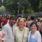 Foreign tourists celebrating Pohela Boishakh in Bangladesh wearing traditional Bengali clothes at Ramna Batamul cultural festival