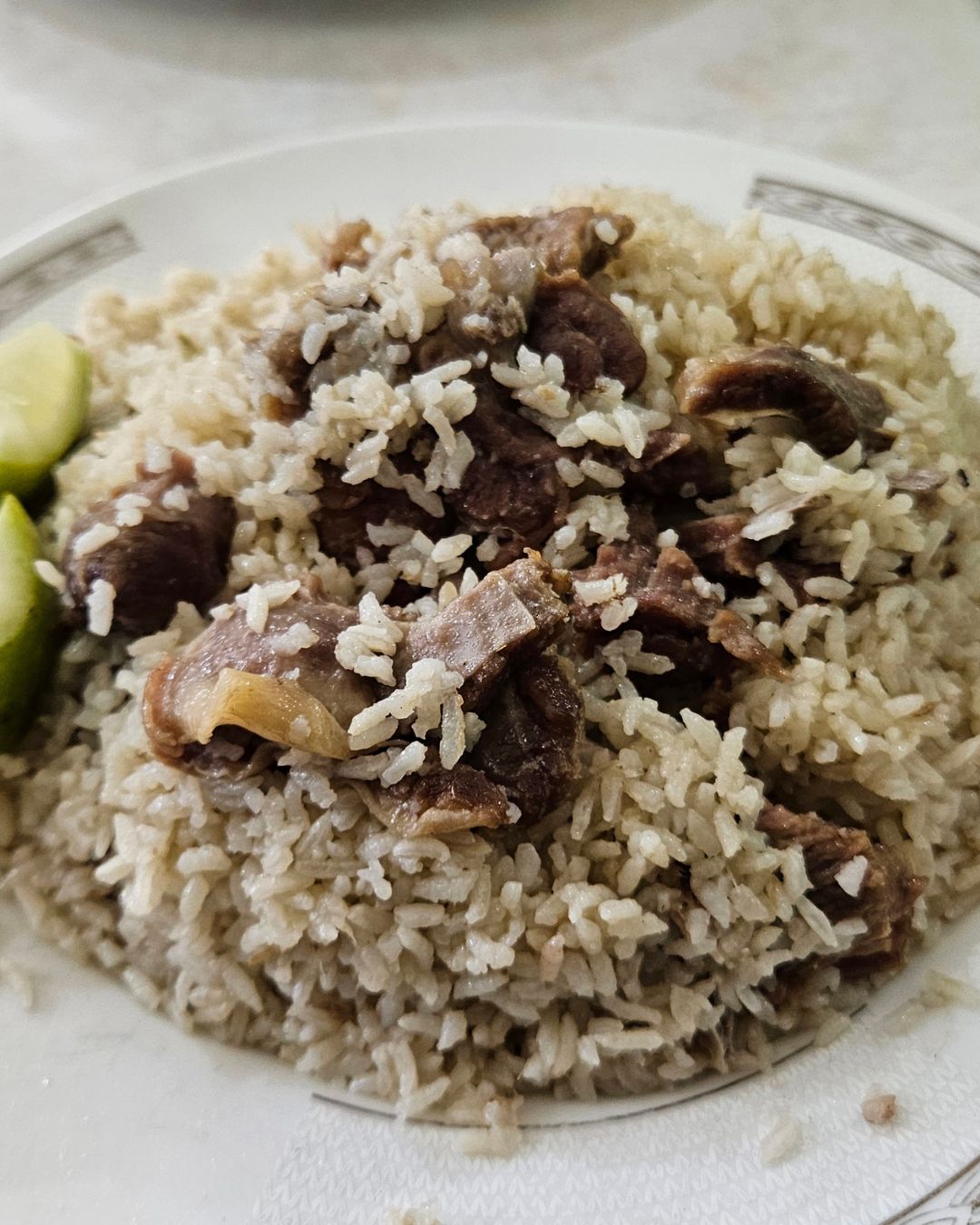 Traditional beef biryani served at Haji Biryani Old Dhaka with aromatic rice and spices