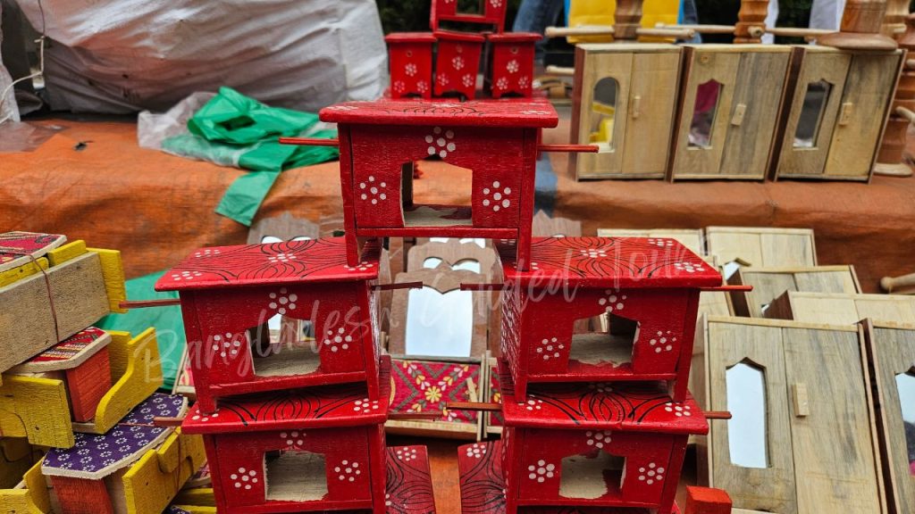 Handmade toy palki crafted from wood and bamboo at Pohela Boishakh fair in Dhaka