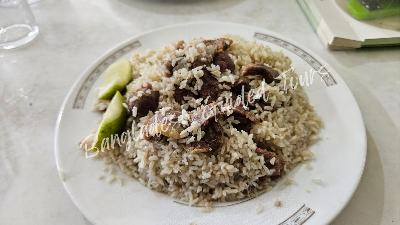 Traditional beef biryani served at Haji Biryani Old Dhaka with aromatic rice and spices