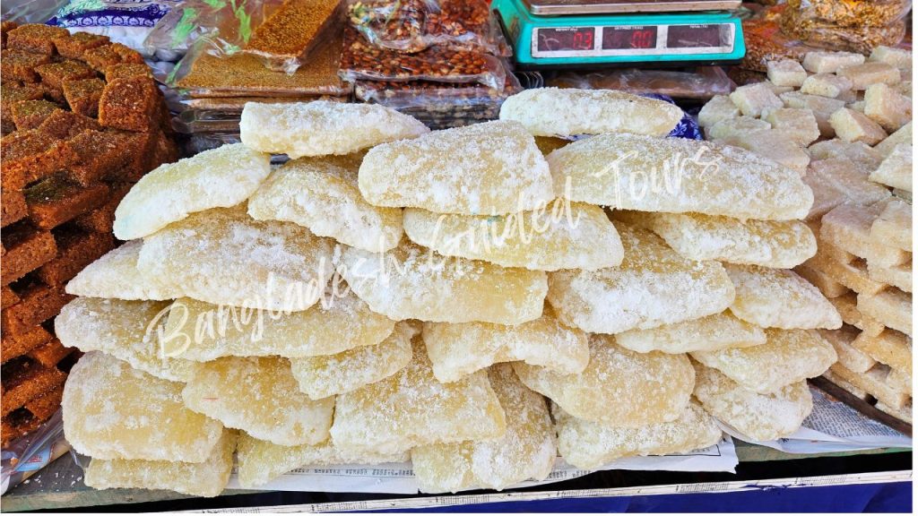 Traditional Jali Kumrar Morobba (candied winter melon sweet) in Old Dhaka, a Mughlai-style Bengali dessert preserved in sugar syrup for foreign tourists in Bangladesh